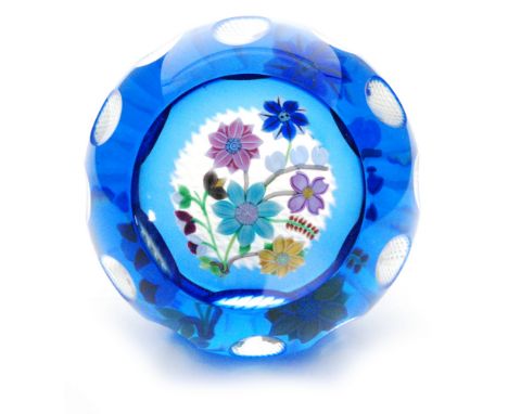 A late 20th Century limited edition Perthshire Paperweight titled Bouquet Overlay, internally decorated with a fine lamp work
