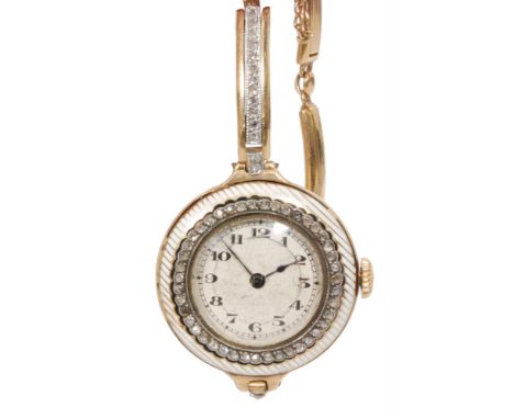 A late 19th Century French diamond and enamelled ladies wrist watch, circular engine turned dial with Arabic numerals, within