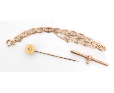 A 1930s 9ct link bracelet, a diamond set stick pin and a 9ct T bar (3)