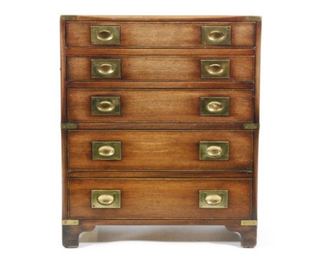 A small 20th Century brass cornered mahogany military style chest of four drawers on bracket feet, width 60cm
