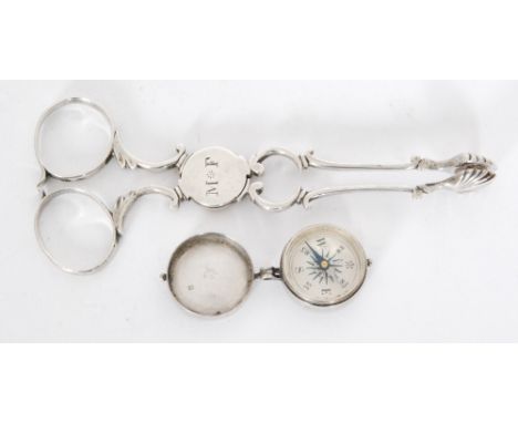 A Victorian hallmarked silver cased small circular compass engraved with a steam paddle ship to hinged lid, diameter 2cm, Bir