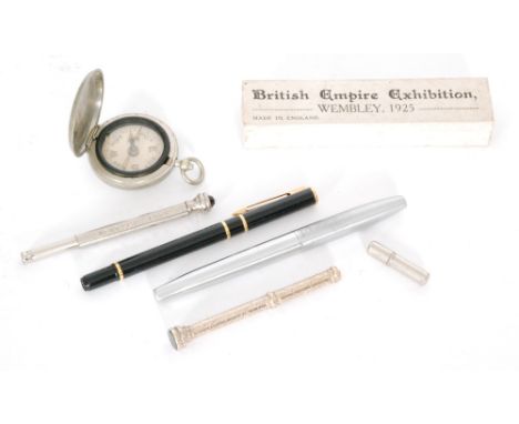 An early 20th Century propelling pencil with engraved decoration S. Mordan & Co with a boxed British Empire Exhibition, Wembl