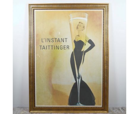 A huge framed poster of the iconic L'Instant Taittinger Champagne advertisement. This elegant artwork features a sophisticate