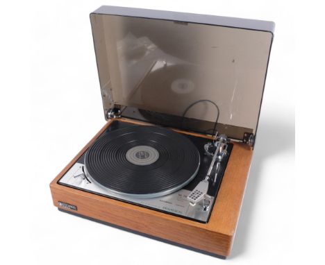 A Vintage Goldring Lenco GL78 stereo transcription turntable, made in Switzerland for Dynatron, with associated instruction m
