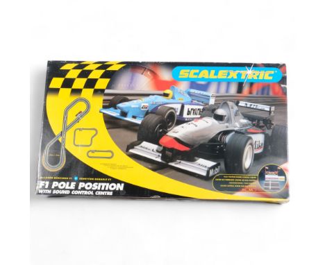 A boxed Scalextric F1 Pole Position with sound control centre, McLaren Mercedes F1 v Benetton Renault F1 boxed set, set appea