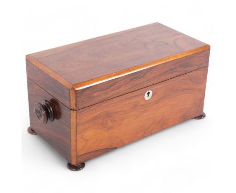 A Regency rosewood tea caddy of rectangular form, 2 fitted lidded boxes (no mixing bowl), and bun feet