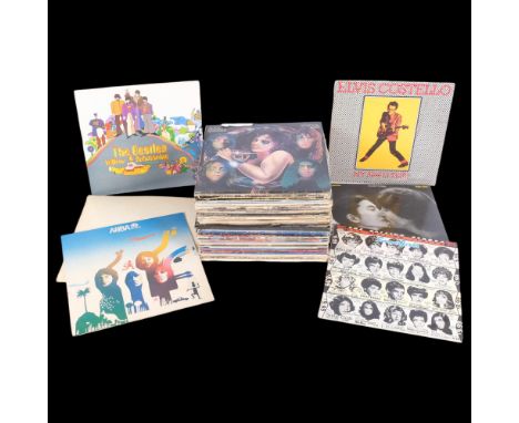 A quantity of vinyl LPs, various artists and genres including Alice Cooper, Atomic Rooster, Madness, The Beatles, Elton John,