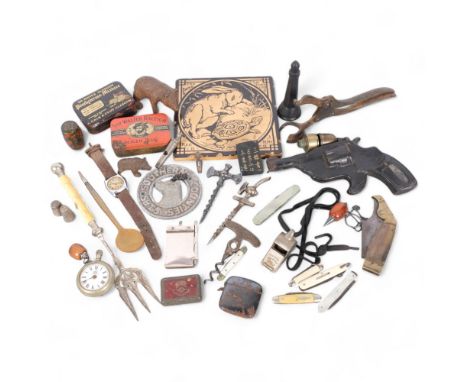 Various items, including a Victorian Aesops fable tile, Black Forest carved bear, tobacco tins, a tartan ware barrel needle b