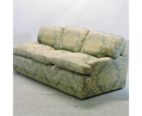 A green upholstered three seater sofa, 208cm