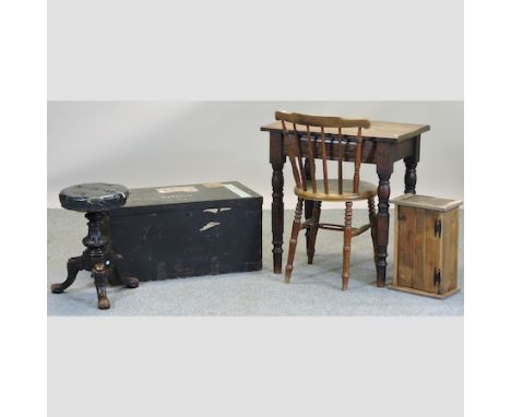 An early 20th century oak side table, 70cm, together with a carved Victorian piano stool, a spindle back chair, a military tr