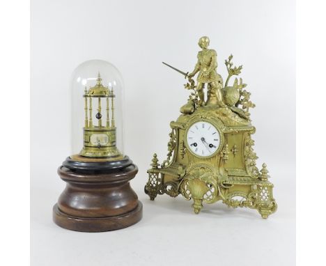 A brass anniversary clock on a stand under a glass dome, together with a French gilt metal mantel clock with a white enamel d