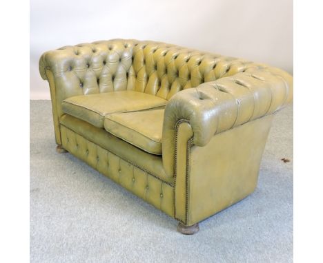 A green upholstered Chesterfield sofa, 160cm