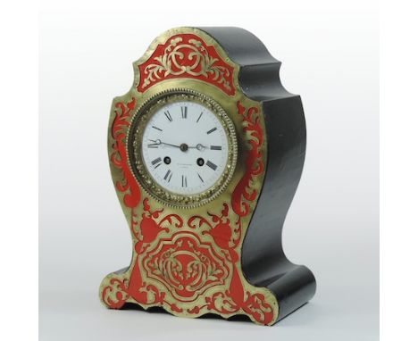 A 19th century French cut brass ebonised mantel clock, the white enamel dial signed Silvestre a Paris, striking on a bell, 29