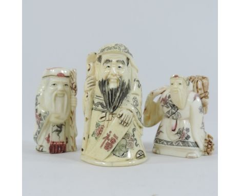 A collection of three carved netsuke, tallest 7cm