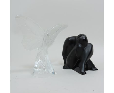A Lalique black glass model of a nude lady, together with a Lalique frosted glass model of a butterfly, 9cm high, both inscri