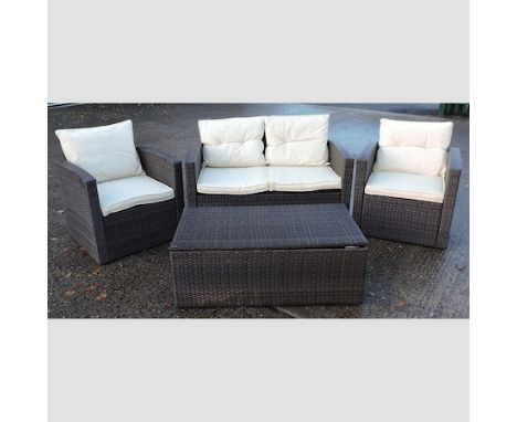 A suite of woven garden furniture, comprising a sofa, 127cm, a pair of armchairs and a table, with a hinged lid, with loose c