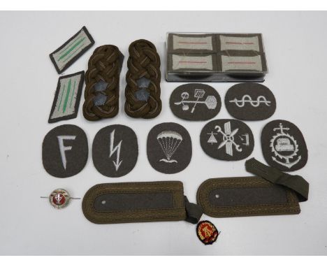 Quantity of East German Army Badges 
