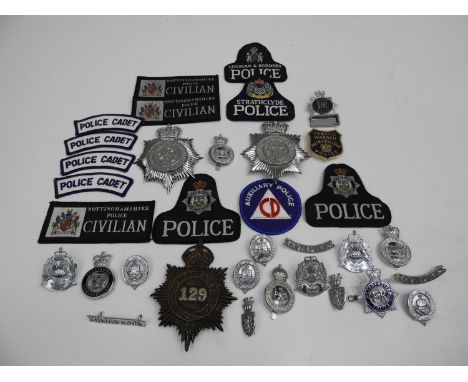 Quantity of Police Helmet Plates and Cap Badges 