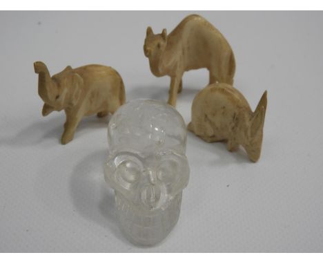 Carved Bone Animals and Crystal/Quartz Skull 