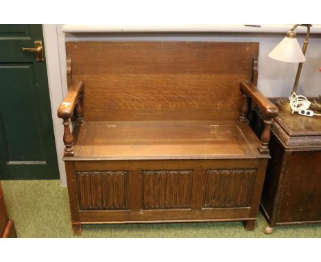 Oak Linenfold Monks bench with turned supports 