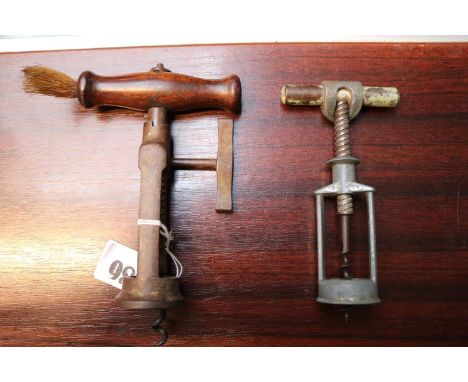 William Lund Type Steel Corkscrew with wooden handle and brush and a another vintage corkscrew 