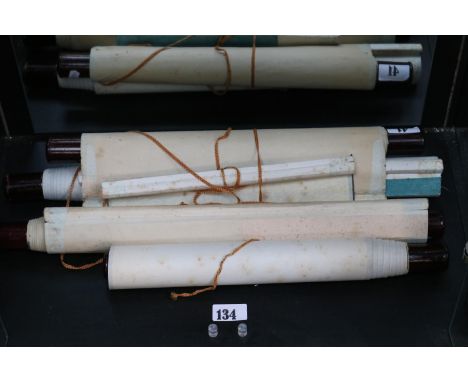 Collection of Chinese scrolls to include 2 Character script and 2 other script scrolls with hardwood ends. Seal marks to each