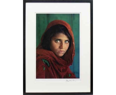 STEVE MCCURRY (AMERICAN b 1950), SHARBAT GULA, AFGHAN GIRL, PAKISTAN offset lithographic colour print, signed lower right in 