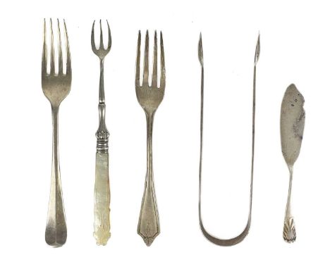 Three silver forks and a pair of silver sugar tongs.  One fork by Barker Brothers Silver Ltd, Birmingham 1935, another by Atk