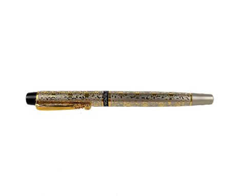 A Mont Blanc rollerball pen with silver and gold plated case with violin neck clip. The interior with Rollerball refill cartr