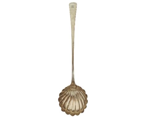 A Silver ladle by William Sumner & Richard Crossley.  With scalloped bowl and bright cut engraving to handle, London 1775, le