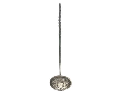 A Georgian silver George I shilling coin set punch ladle. With oval foliate scroll embossed bowl, twisted baleen handle, leng