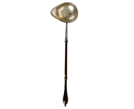 A George III silver punch ladle with turned wood handle. London 1777, length 31cm, 53g.