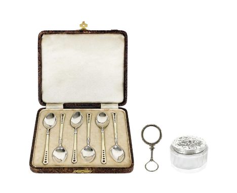 A modern silver cased set of six enameled demitasse spoons by Turner & Simpson. The handles in cream and purple guiloche enam