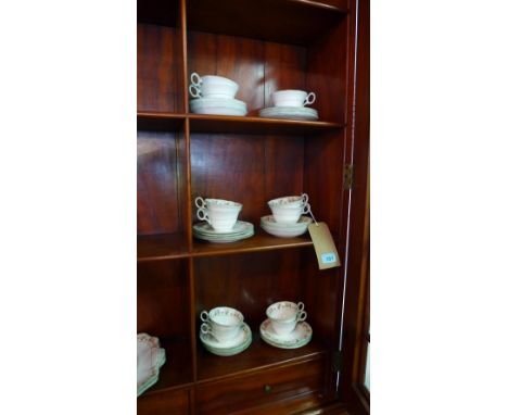 An Adderlys ceramic part tea service, with apple blossom pattern 