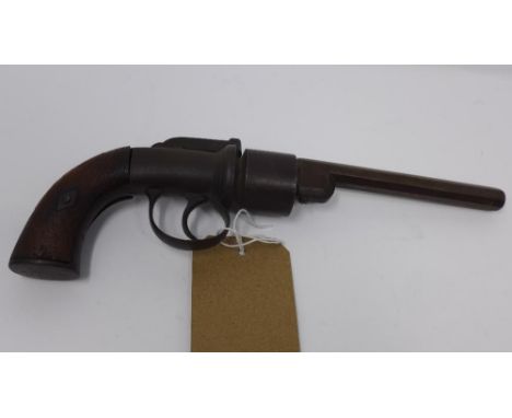 A 19th century percussion revolver, with floral engraved handle