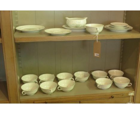 A Limoges porcelain dinner service, Imperatrice pattern, comprising of 12 large plates, 12 coffee cups and saucers 11 small c