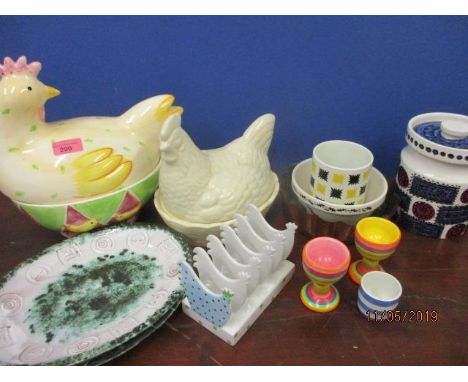 A quantity of kitchenware to include two egg containers in the form of chickens and a Portmerion Susan Williams Ellis storage