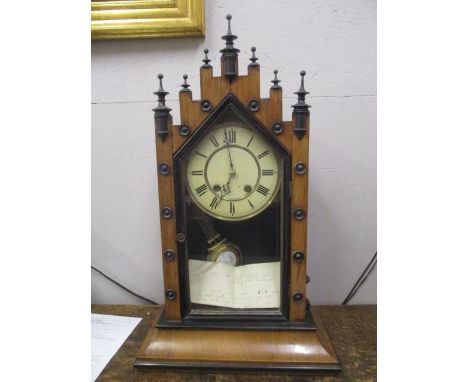 A late 19th century continental walnut and ebonized mantle clock of gothic, architectural design, 24"h 