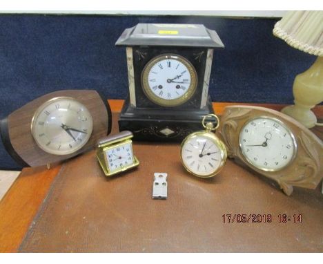 A Victorian marble and black slate mantle clock, with key and pendulum and other mantle and dressing table clocks 