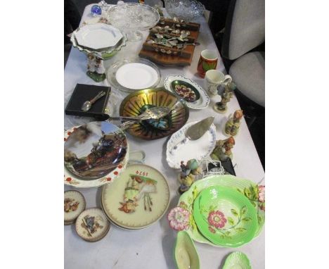 A mixed lot to include Hummel figures and plates, Swarovski, collectors spoons, cutlery and other items 