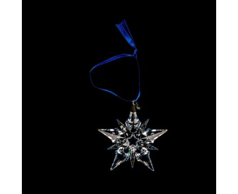 A beautiful clear snowflake with 2001 impressed on a metal tag. Ornament #9445NR200101. Swarovski etched backstamp. This item