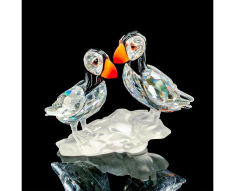 These retired Swarovski crystal puffins were part of â€œFeathered Beautiesâ€ theme group. The piece features finely detailed 