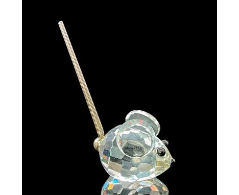 The mini mouse is made from clear crystal with black eyes and nose, featuring a metal spring coil tail and no base. Swarovski