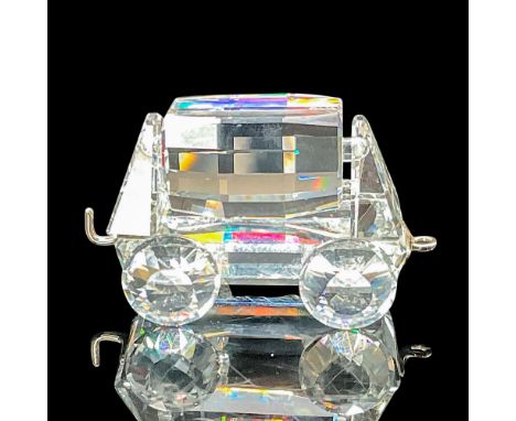 The fifth car in the When We Were Young train set. The Tipping Wagon is fully faceted clear crystal, with metal hooking devic