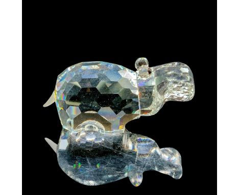 This retired Swarovski crystal hippo was part of the â€œAfrican Wildlifeâ€ theme. It is made from clear crystal with a froste