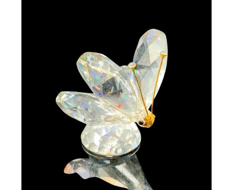 This retired Swarovski butterfly was part of the "In A Summer Meadow" collection. It is made from clear faceted crystal with 