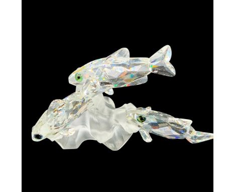 This retired Swarovski piece was part of the â€œSouth Seaâ€ theme. Depicts three faceted lead crystal fish swimming around fr