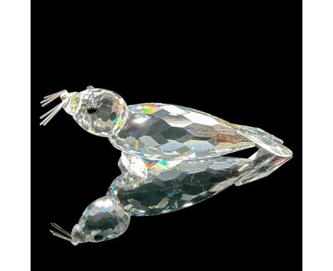 The clear crystal seal has black eyes, and it is believed to be the first issue of the large seal available in the USA. Swaro