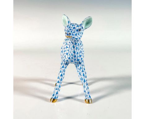 Hand painted figure featuring a beautiful baby deer decorated with a blue fishnet pattern and gilded accents. Herend backstam