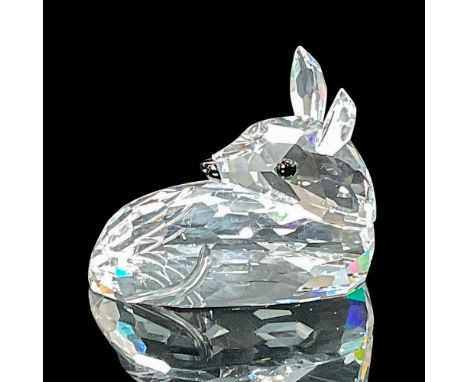 Made in clear crystal. The deer has black eyes and a black nose. Swarovski etched backstamp. This item has its original box w
